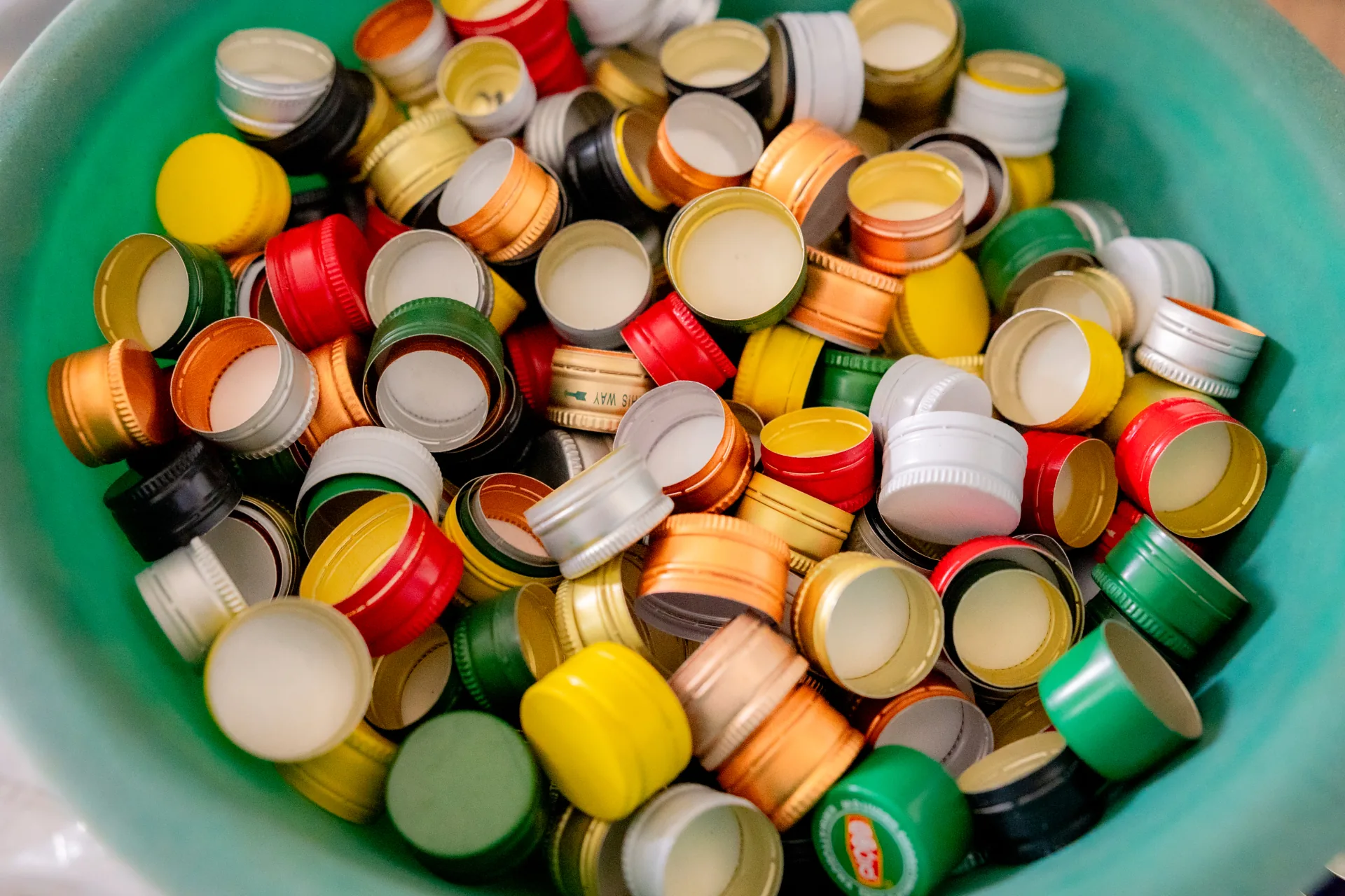 Colourful aluminium ROPP bottle closures